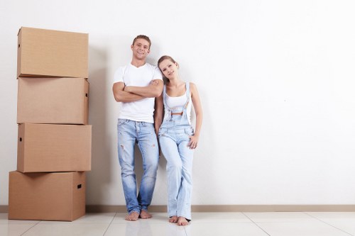 Furniture removals team handling household items in Edgware