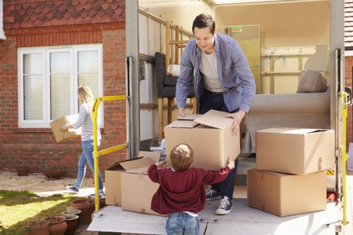 Removal van and moving team preparing a local move in Edgware