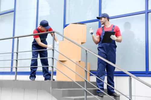 Moving team loading items safely into a van