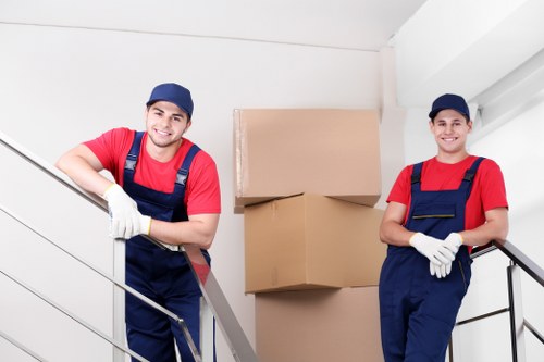 Man with van service in Edgware loading moving boxes