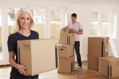 Office relocation planning in Edgware with moving boxes and desk setup
