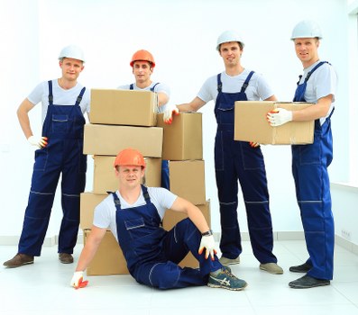 Removal team planning a home move in Edgware with boxes and furniture