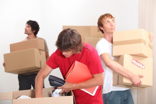 Commercial furniture and IT items being organised for relocation