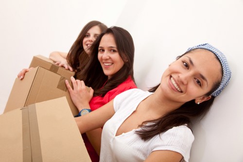 Van moving boxes and belongings across Edgware streets