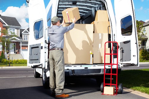 Local removals team handling office furniture and equipment