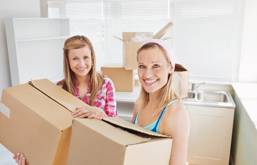 Insured and safety-focused Edgware man and van team handling belongings carefully