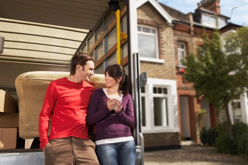 Efficient movers unloading boxes and furniture in Edgware